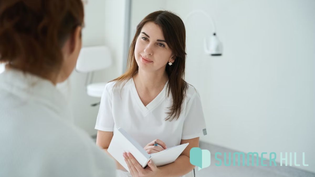 Mental health clinic services, an intake nurse talks with a patient about available services.